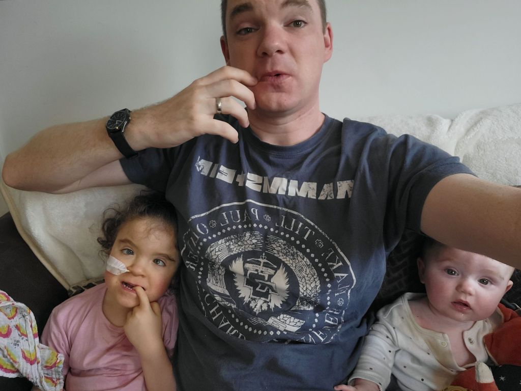 Photo of Stephen with his two daughters.