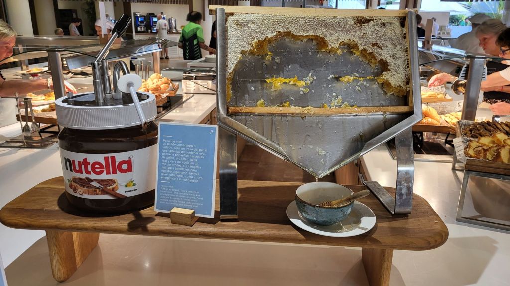 A giant Nutella pump and a honeycomb at the breakfast buffet.